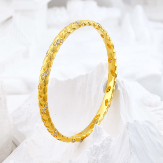 Gold-Plated Braided Bangle with Sparkling Stone Accents