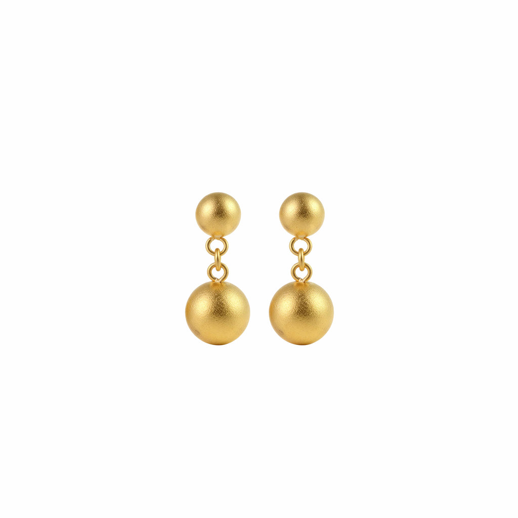 Front view of 24K gold vermeil double sphere drop earrings on white background.