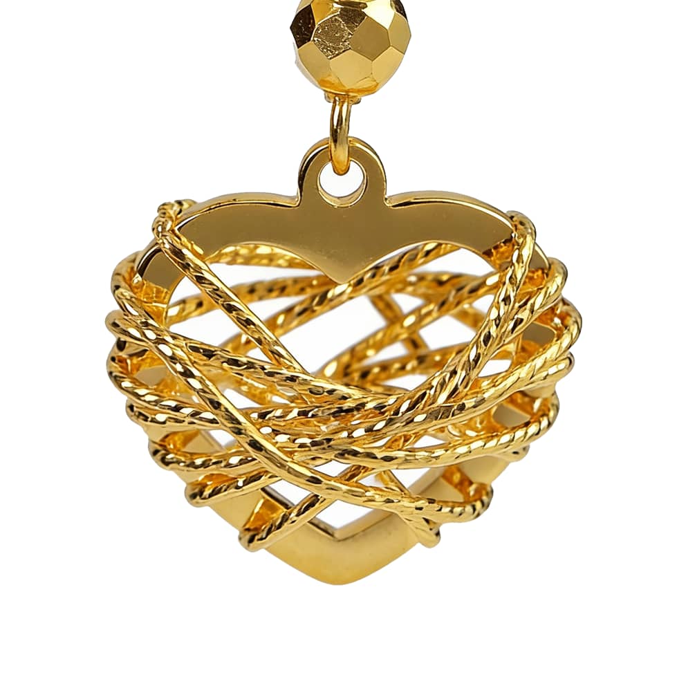 Close-up of Brand Gold Woven Heart Earring, showing intricate wire craft and golden bead detail.